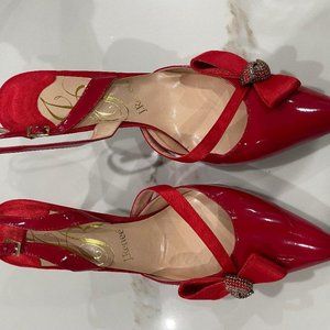 Stunning Red Patent sling back.